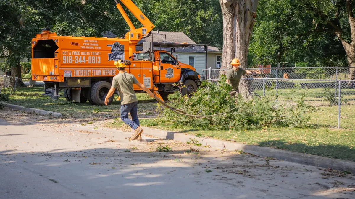 Ironwood Tree Service emergency response truck at a storm damage job in Tulsa, OK