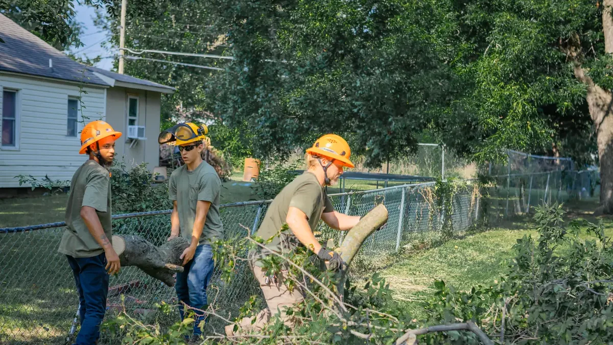 Ironwood Tree Service crew clearing storm debris and fallen trees in Tulsa, OK