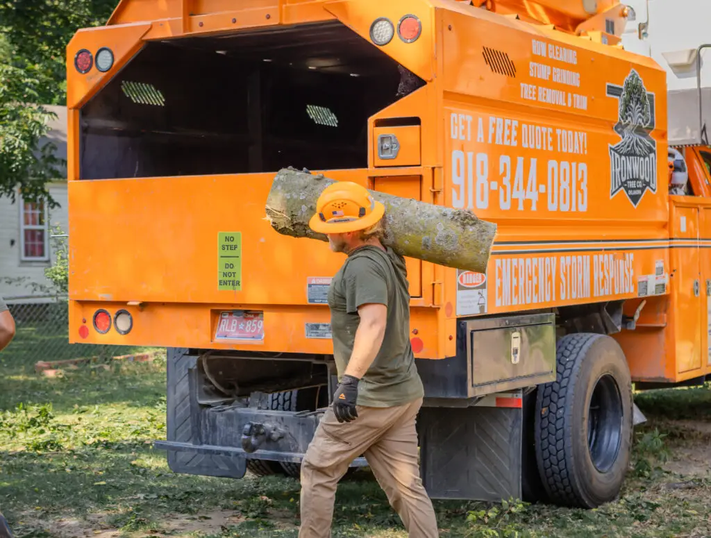FAQ Austin Carrying Logs on Jobsite